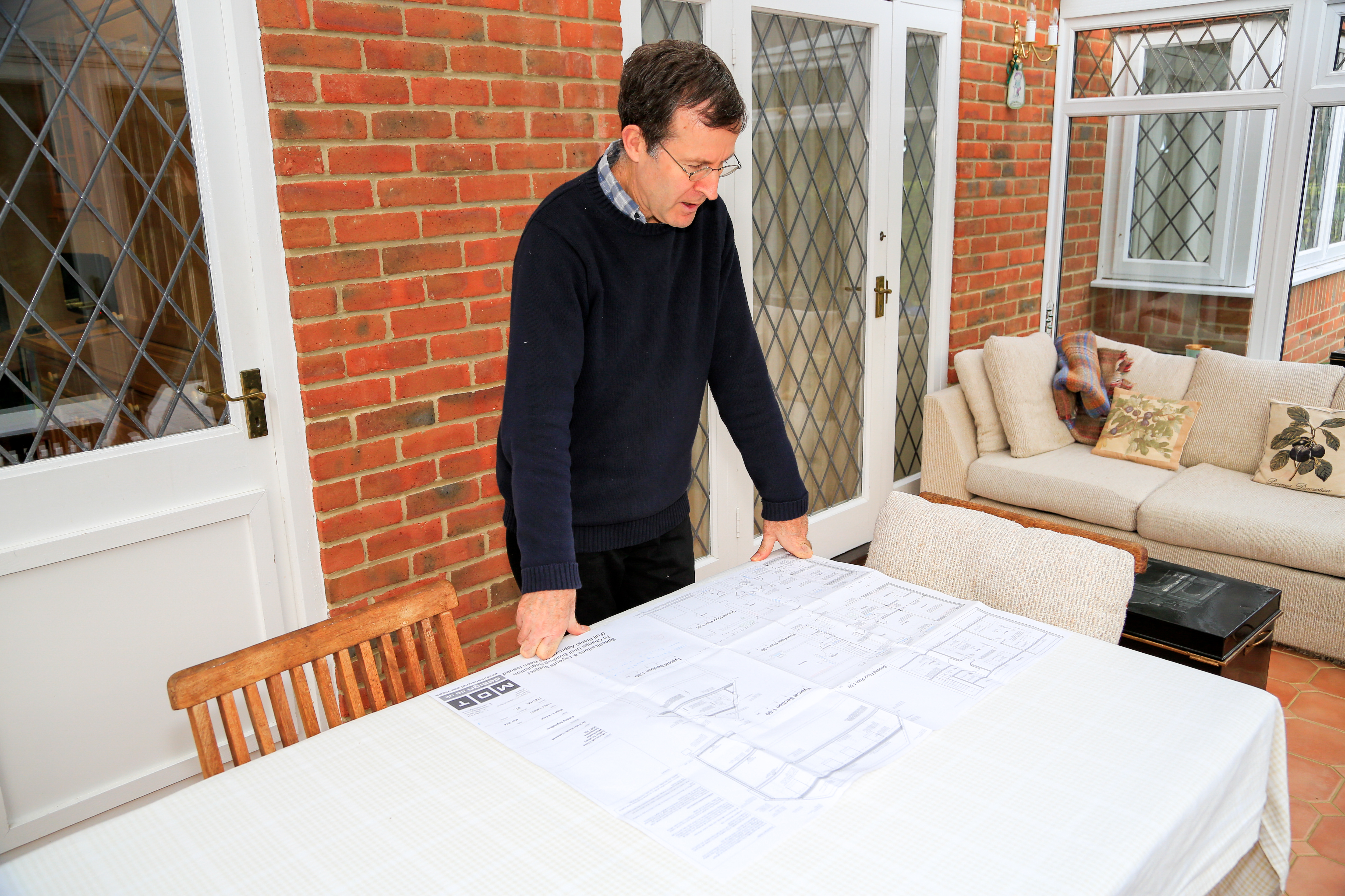 Architect drawing up plans